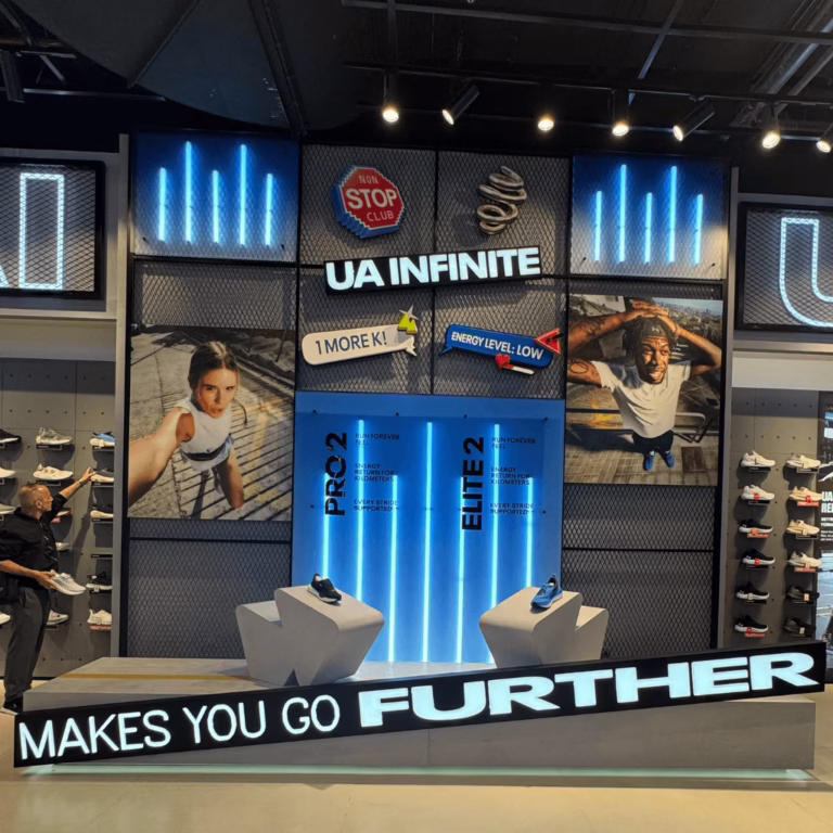 Best POS Display in Dubai: Under Armour Footwear Wall by New Royal Advertising LLC